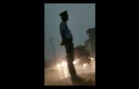 Assam cop wins hearts, stands on duty amid rainstorm